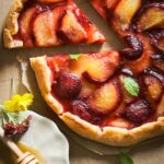 Rustic plum galette recipe with raw honey and vanilla ice cream
